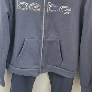 XL Bebe fleece jacket and faux leather pants.